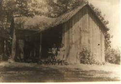 Click to enlarge image  - The Old house - The Old house Mrs. Quigley and her 5 children tore down while Mr. Quigley was at work. 